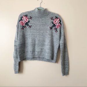 Urban outfitters• soft knit floral patch crop